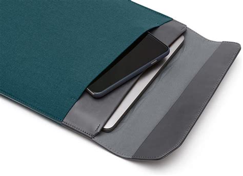 🔥 Hot Deals Bellroy Laptop Sleeve Extra (Fits 12 Inch Laptops or Macbooks, Leather Foldover Magnetic Closure, Side Pocket for Cables, Documents Or Notebooks) - Teal - Woven